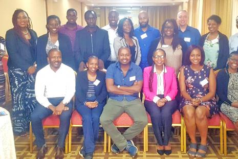 Dr. Marianne Wanjiru Mureithi (seated in the front row in pink) together with other African researchers at the Global HIV Vaccine Enterprise workshop in Kigali, Rwanda. 