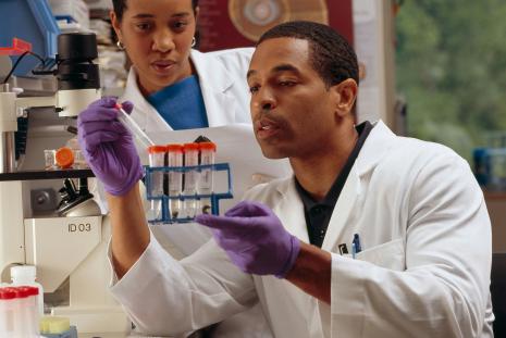 Scientists in a laboratory. Photo Credit: National Cancer Institute